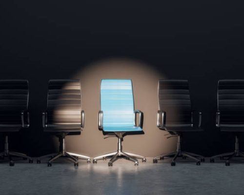 Job interview, recruitment concepts. Row of chairs with one odd one out. Job opportunity. Blue chair in spotlight. Business leadership. 3D Rendering